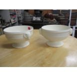 A pair of Wedgwood cream glazed china fruit bows with rams mask handles