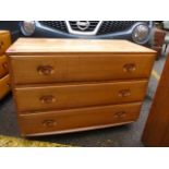 An Ercol chest of three long drawers, 26" x 36"