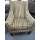 A contemporary John Lewis oversized armchair in a brown striped fabric, with mahogany feet