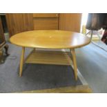An Ercol, elm and ash two tier coffee table, 17 1/2" h x 39"w