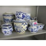 Blue and white ceramics to include various planters, bowls and jugs