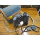 A pair of Miranda binoculars in travelling case