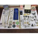 A mixed lot of costume jewellery to include vintage marcasite brooches and necklaces, together