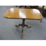 A Georgian mahogany tilt topped occasional table having a turned column, on splayed legs, 21 1/2"h x