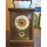 A late 19th century brass cased carriage alarm clock, 4 1/2"h