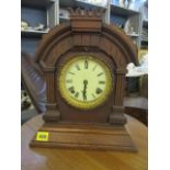 A late 19th century American mahogany mantle clock, the dial inscribed Ansonia Clock Company, 14" h