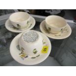 Three cups and saucers, Christopher Robins nursery set by Ashtead Potters