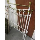 An early 20th century white painted metal bed-frame, 52 1/2"h x 35"w