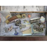 A vintage lot to include enamel badges, World War I silver brooches, a gilt brass pendant compass, a