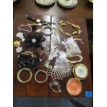 A mixed lot of costume jewellery to include ladies wristwatches and other items