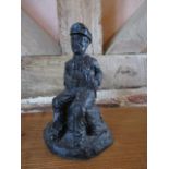 T Gowland 1980 - a composition sculpture of a seated coal miner
