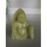 An early 20th century small oriental carved, soapstone figure of a Buddha,