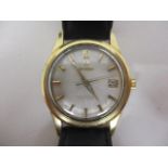 An Omega constellation gents automatic chronometer gold plated wristwatch, having a silvered dial,