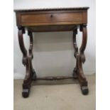 A William VII rosewood work table, the top having a gadrooned edge over a drawer, a slide and C