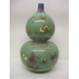 A 19th century Chinese Celadon glazed, double gourd vase decorated with fruit, a vase, a dog, boxes,