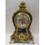 A late 19th century French Boulle work mantle clock having gilt brass, floral and scrolled mounted
