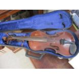 An early 20th century violin and a two piece back and ink purfield edge