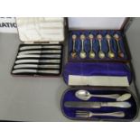 A cased set of six silver handled butter knives, Sheffield 1934, marked G H for Harrison Brothers