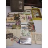 A collection of early 20th century postcards, mostly franked 1900-1950s, together with an 1863