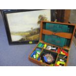 An unsigned oil on board with a windmill in the background, framed, together with a vintage roulette