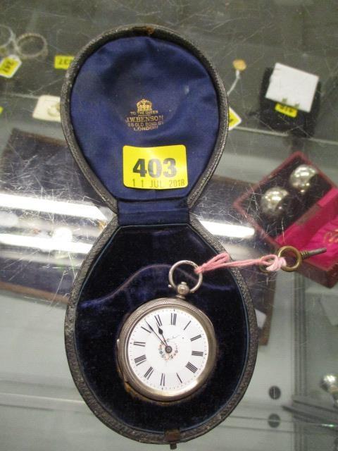 A 19th century silver pocket watch with an enamelled face and floral design, cased - Image 2 of 4