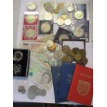 A quantity of coinage to include £5 commemorative coins and British bank notes