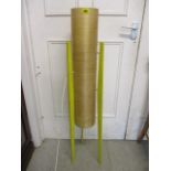 A retro tripod yellow fibreglass and wooden framed floor standing lamp