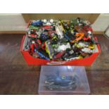 A collection of mainly Hot Wheels model toy cars and a boxed Batman movie model car