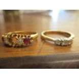 Two 18ct gold rings, one set with rubies and diamonds, one stone deficient and the other set with