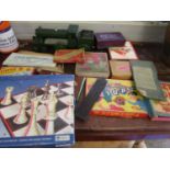 A selection of vintage games and a painted wooden train engine