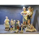 A selection of figures to include an Austrian cream ware figure group, a Sitzendorf figure of a lady