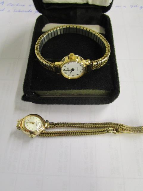 A Cortina 9ct gold cased ladies' wristwatch on a 9ct gold bracelet, and a Sekonda quartz ladies'