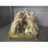 A 19th century Continental figural group of three musicians, 7"h