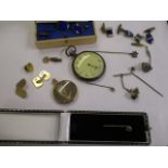 A mixed lot of jewellery to include a pair of 9ct gold cuff links, a pocket watch, stick pins and