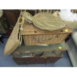 A Victorian mahogany chest of eight short drawers, a vintage canvas suitcase, a wicker hamper and