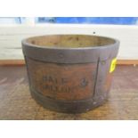 A half gallon wooden and iron coopered measure