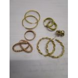 A group of 9ct yellow and rose gold and yellow metal hoop earring, total weight 14.4g