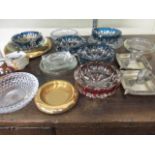 A selection of glass and ceramic ashtrays