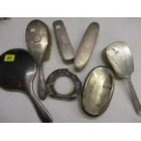 Silver backed brushes, together with a tortoiseshell backed hand mirror and a piece of scrap silver