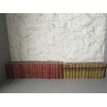 A set of thirteen Walter Scott leather bound books, a set of twenty-one Charles Dickens books and