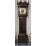 A George III oak, eight day longcase clock, having a substantial movement numbered 1116, gilt dial