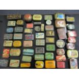 a quantity of small vintage pictorial tins, to include cocoa, pins, needles and tea tins