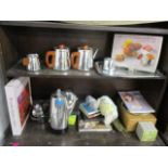 A mixed lot to include books, stainless steel kitchen items and three tea chests