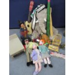 Two baseball bats, an over-sized elephant soft toy, a vintage Golly rag doll, a retro Match box