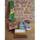 Circa 1950 to 1980, games to include Travel Monopoly and bone dominos