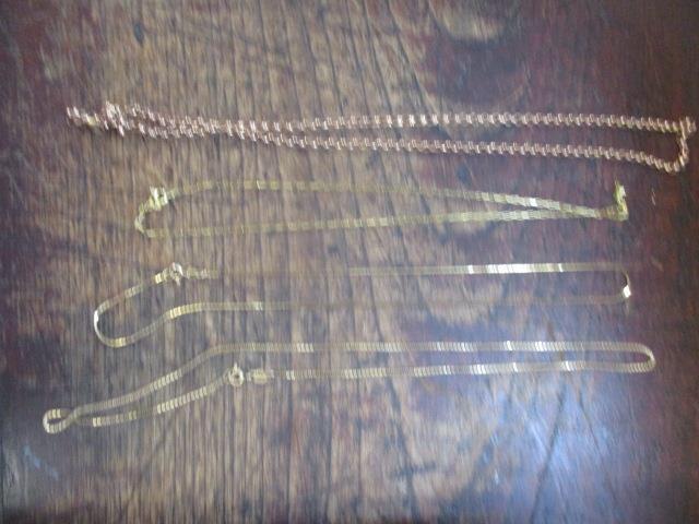 Three fine 9ct gold necklaces and a rose gold necklace, 22.9g