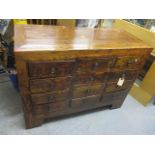 A 20th century hardwood bank of twelve drawers, 37 1/2" h x 49 1/4" w
