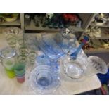 A selection of blue glassware to include candlesticks, bowls and various other glasses