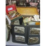 An original stock breeder's medicine chest, vintage holiday postcards, ephemera and a small