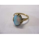 An 18ct gold opal set ring